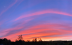 Sunset with pink clouds and a blue sky. Opal Theory Polish Drenched Skies inspiration.