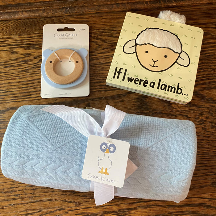 What a perfect gift for a new baby! It's designed with soft fabrics and made to get softer with each use. It's sure to keep your baby warm and you'll be thrilled when it's their favorite blanket!  Details:  97% Polyester / 3% Spandex 30” x 40” Tested and approved for infants. Book and teether sold separately.