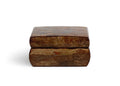 Wooden box with a textured surface by Denshiro on a white background