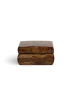 Wooden box with a textured surface by Denshiro on a white background