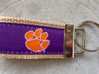 Clemson purple, orange paw