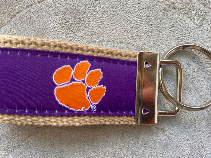 Clemson purple, orange paw