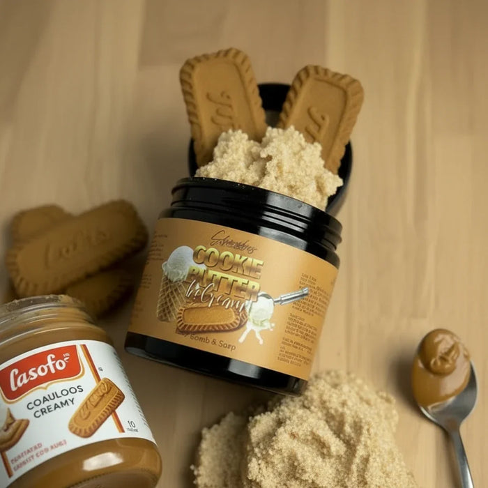 Cookie butter body care scrub jar with biscuits and a spoon of creamy spread on wooden table