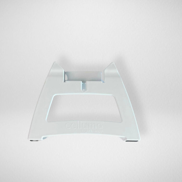 One Celluma branded facial stands to position upright when treating the face-neck-décolleté on acne or aging mode using red or blue light therapy.