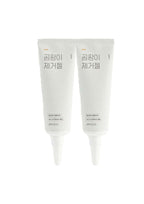 Two white tubes with black text on a white background