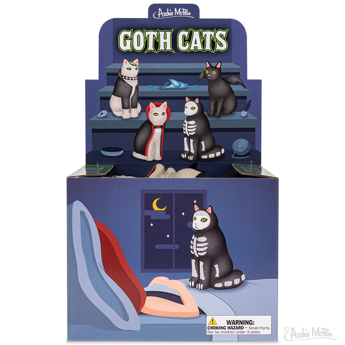 The display box showcases Goth Cats figures in a vinyl bedroom scene and includes a clear warning label.