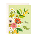 Floral card with colorful flowers and the text 'Thank you' on a light green background.