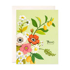 Floral card with colorful flowers and the text 'Thank you' on a light green background.