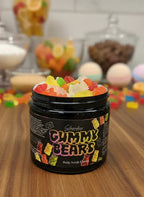Gummy Bears body scrub jar with colorful gummy bears on wooden surface, blurred sweet treats in background