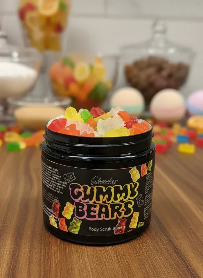 Gummy Bears body scrub jar with colorful gummy bears on wooden surface, blurred sweet treats in background