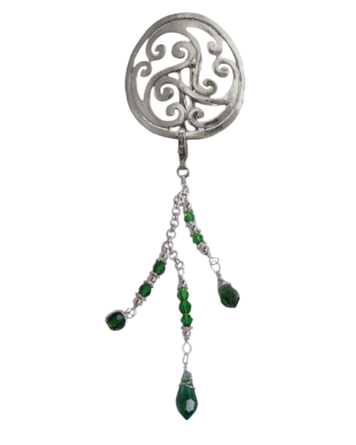 Silver scrollwork hair hook with dangling green bead charms, front view