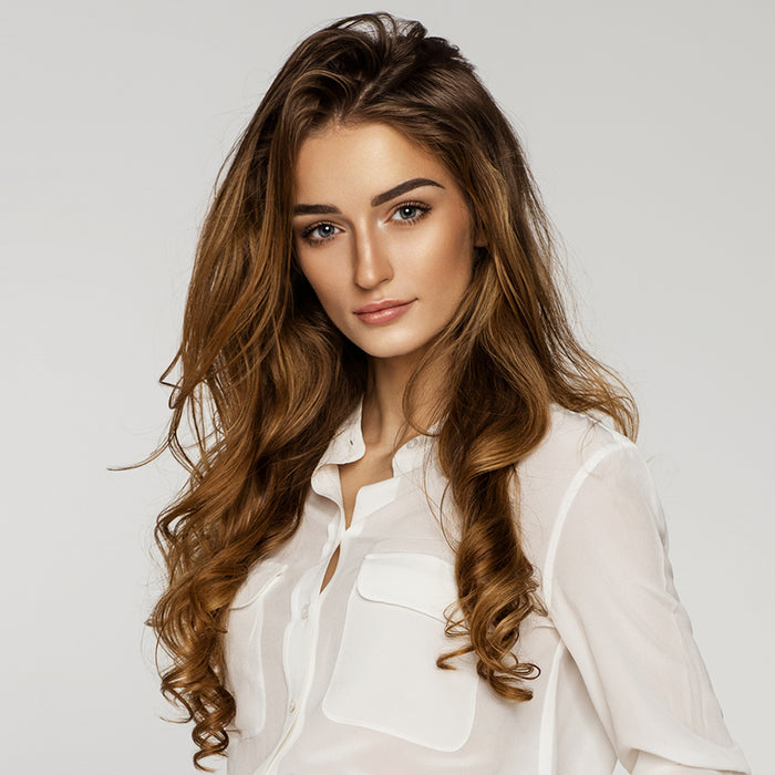 ANNIE extra long ceramic curling iron creates loose salon waves on model with long brown hair