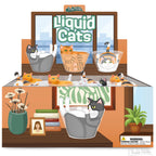 Liquid Cats: Illustration of cats lounging in bowls and cups, featuring playful bouncing balls. Warning: contains small parts.