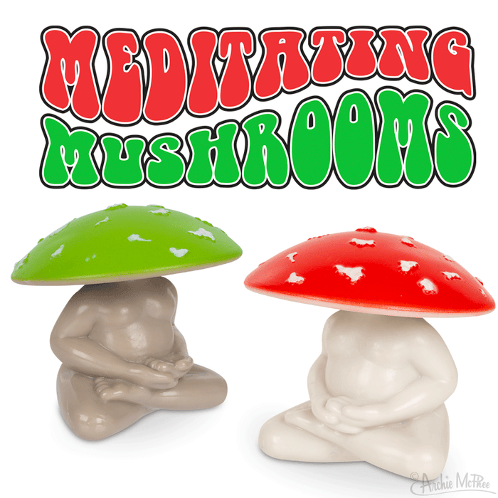 Two collectible figures of mushrooms with red and green caps sit in meditation beneath the text "Meditating Mushrooms.