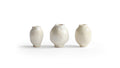 Silhouetted image of 3 varying mini white glazed mini vases from the Mini Vase Set - Trio I by Dani Sujin x Nalata Nalata against white background.