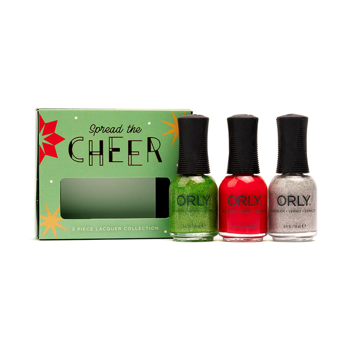 A 3 piece nail polish collection by ORLY, with bottles in green, red, and silver colors, displayed alongside their packaging that reads 'Spread the Cheer'.