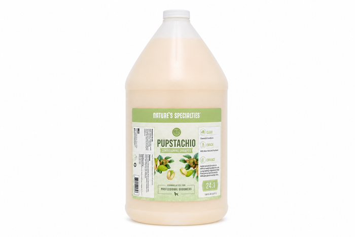 A large plastic jug of Nature's Specialties Pupstachio pet shampoo, showing the light beige liquid inside, on a solid white background.