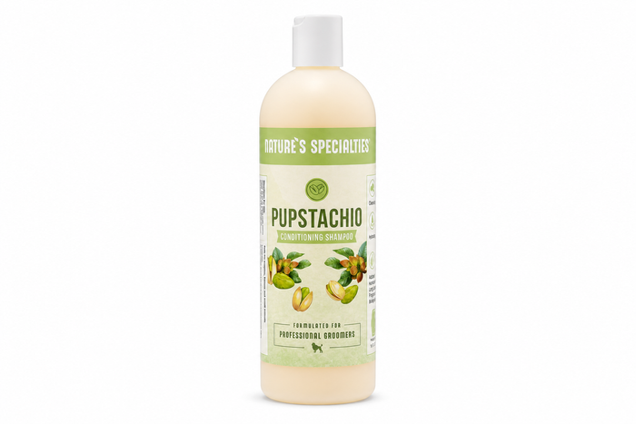 A plastic bottle of Nature's Specialties Pupstachio pet shampoo, showing the light beige liquid inside, on a solid white background.