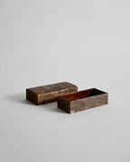 Open wooden small box with lid by Denshiro on a light gray background