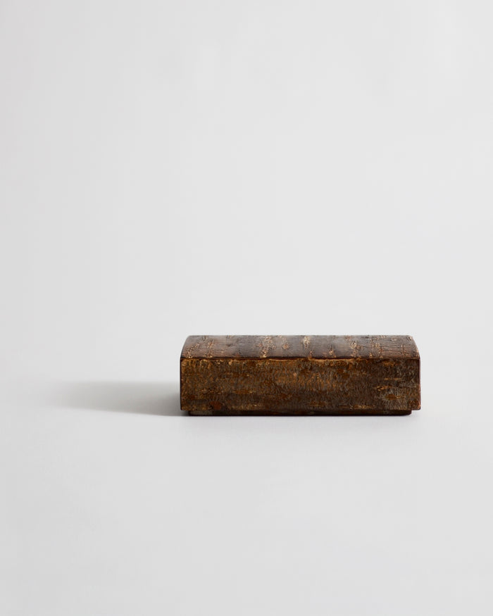 Small wooden box by Denshiro on a gray background