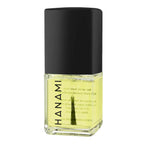 Yellow nail polish bottle with black cap on a white background.