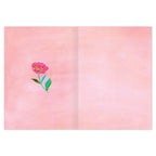 Open card with a pink flower illustration on a pink background