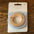 What a precious teether for those little ones that you love! These teethers are made with the softest silicone and natural birch wood that is sourced from the US. They're perfect for soothing sore gums and easily held by previous tiny fingers!  Details:  • Suitable for ages 4+ months • Does not contain PVC, BPA, Phthalates or other toxic materials • Complies with applicable ASTM, CFR & EU standards • Clean with mild infant safe soap or a wet wipe.  Blanket and book sold separately.