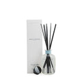Diffuser bottle with black sticks and packaging labeled 'Soap & Water' on a white background