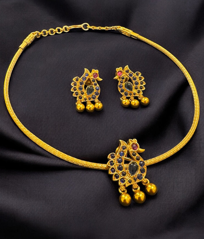 The Lasaka Silver Peacock Blue Kemp Pendant Set