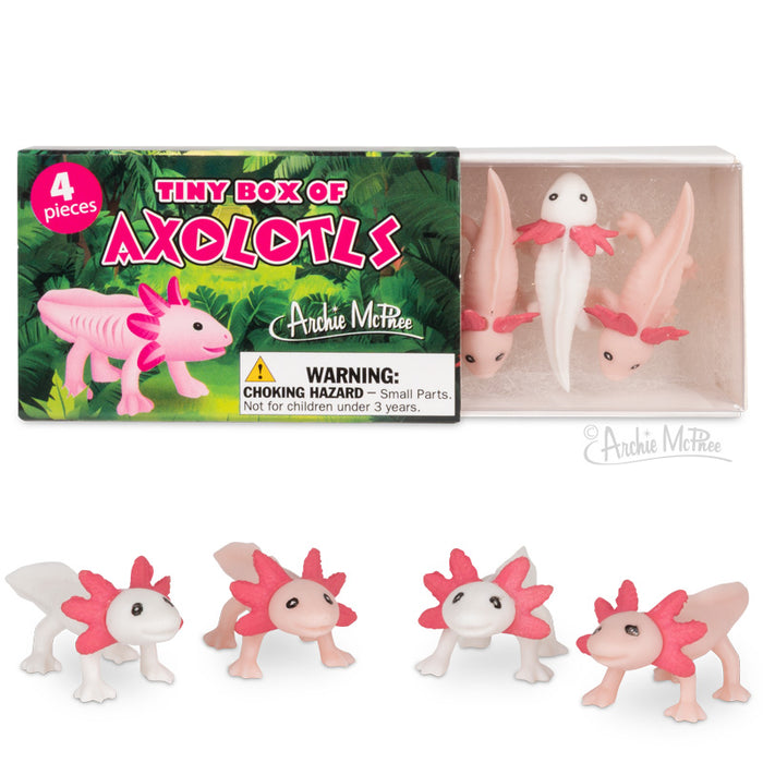 Tiny Box of Axolotls includes a set of four pink figurines featuring wide smiles and playful poses.