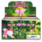 Tiny Box of Axolotls display box features pink axolotl figurines with a garden theme, includes a warning for small parts on the front.
