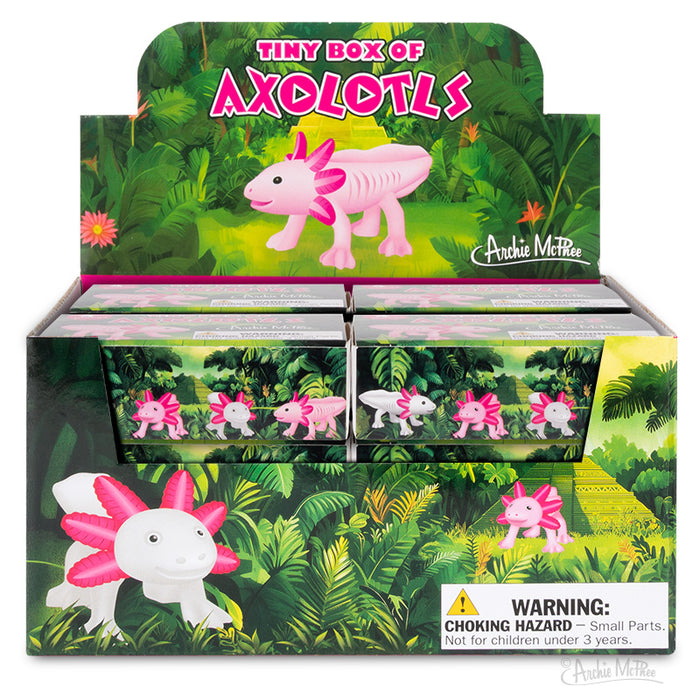 Tiny Box of Axolotls display box features pink axolotl figurines with a garden theme, includes a warning for small parts on the front.