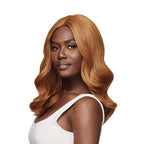 OUTRE model wearing WIGPOP synthetic hair wig LAINA 18 inch in honey blonde with soft waves